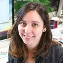 Smiling woman at workplace desk