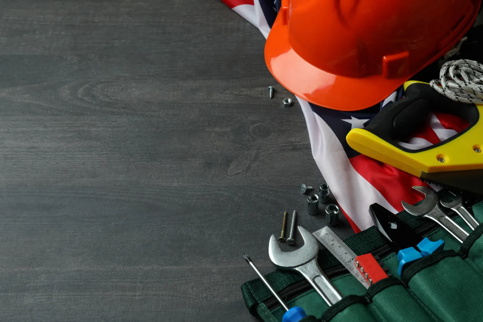 Construction tools with American flag background
